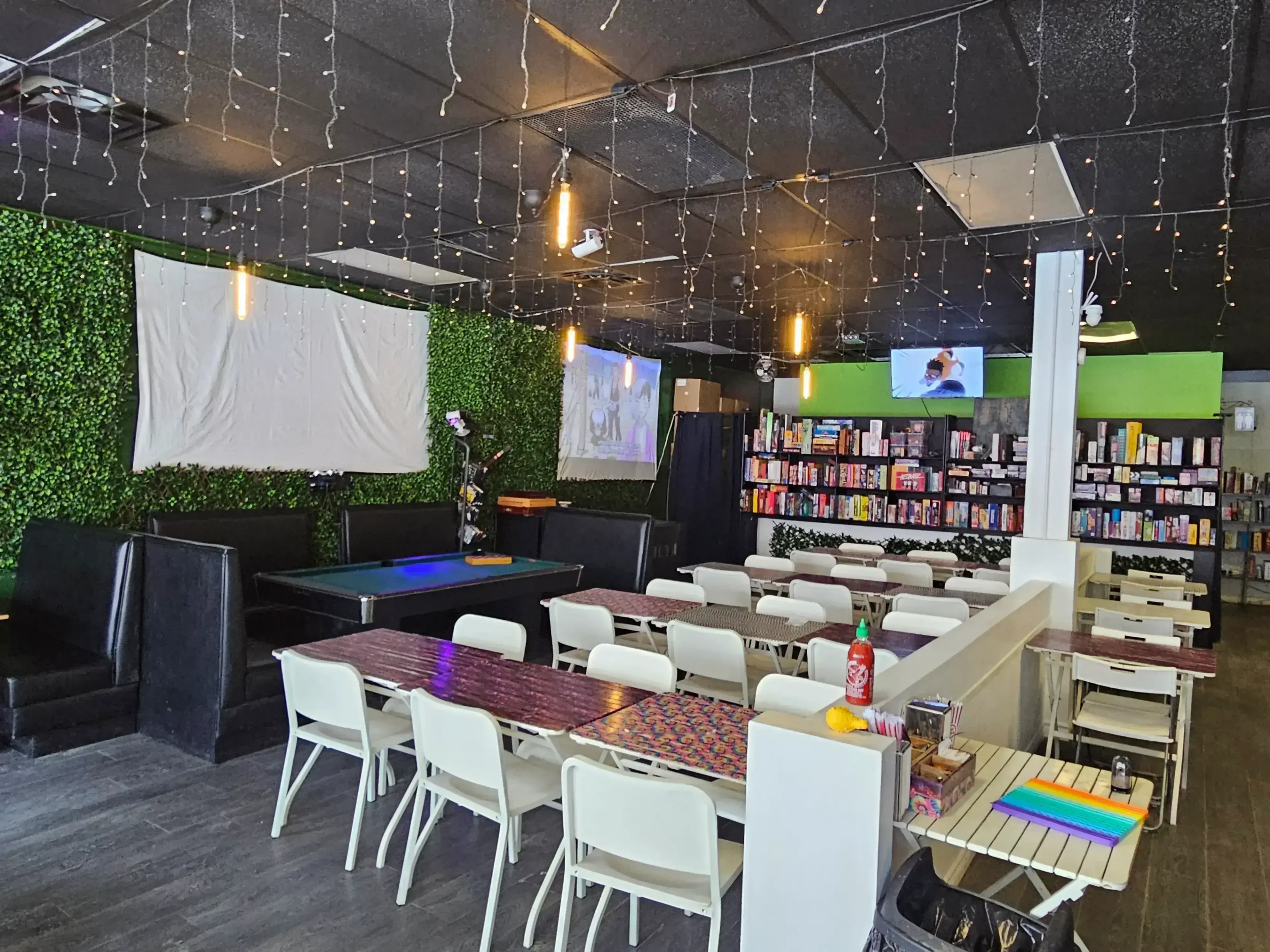 Interior View of Hangout Cafe with seating and board games